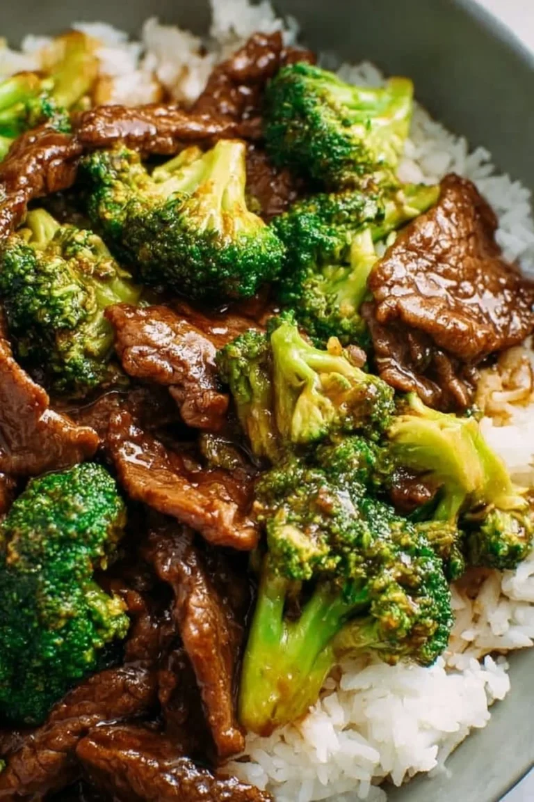 Delicious plate of Chinese Beef and Broccoli stir-fry with fresh vegetables